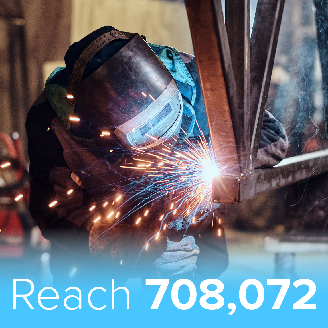 A welder wearing protective gear, including a helmet and gloves, works on a metal structure, producing bright sparks. The background is blurred, suggesting an industrial or manufacturing setting. A blue banner at the bottom displays the text 